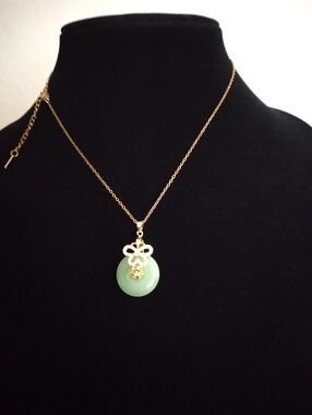 Gold Chain Necklace with Green Jade Disc and Bow Pendant